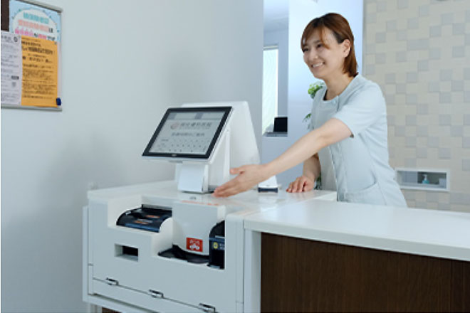 受付での丁寧な対応のイメージ