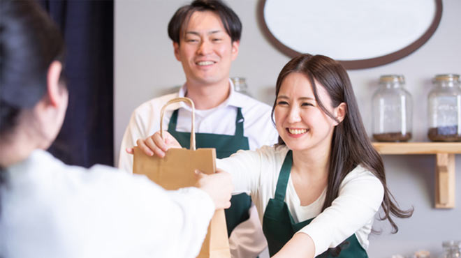 メタバース空間にてショッピングしている女性のイラスト画像