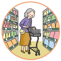 シニアが店内でショッピングカートを押している画像