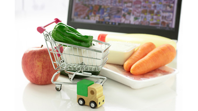 買い物カートと食材のイメージ画像
